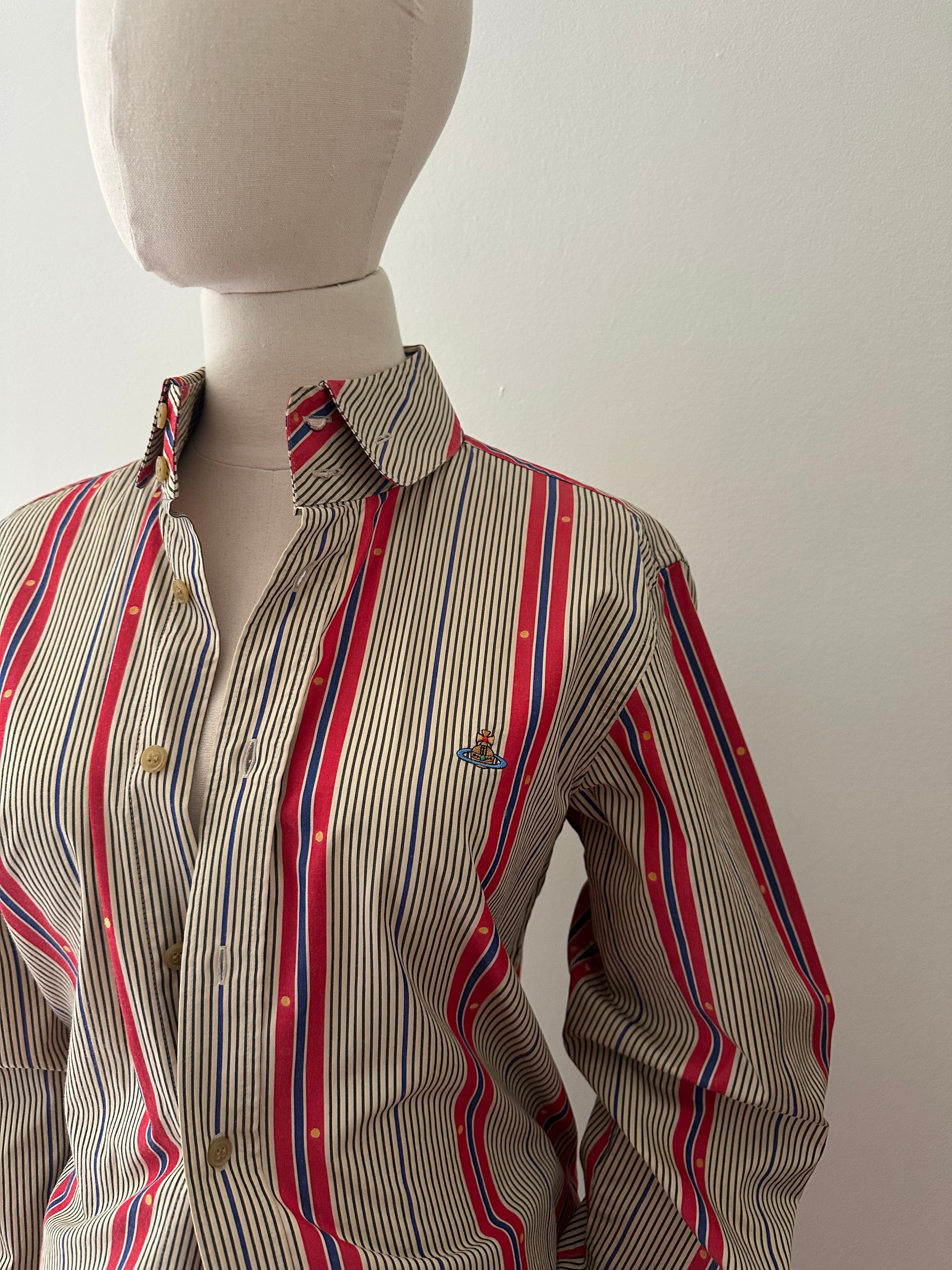 Close-up of vintage Vivienne Westwood regimental stripe cotton shirt showing orb embroidery at chest, tall collar stand, double button detail, and cream buttons, c. 2007–2012.